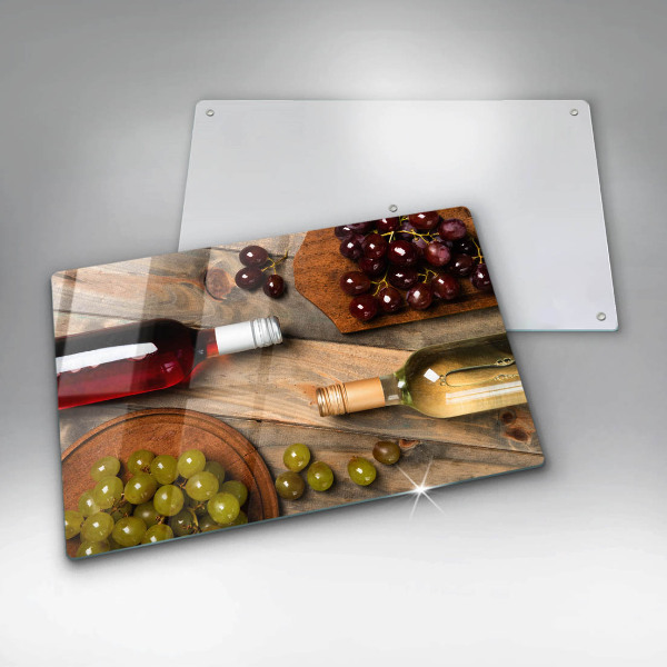 Cutting board Bottles of wine and grapes