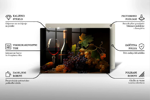 Cutting board A glass of wine and grapes