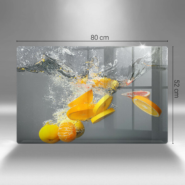 Chopping board glass Lemons in water