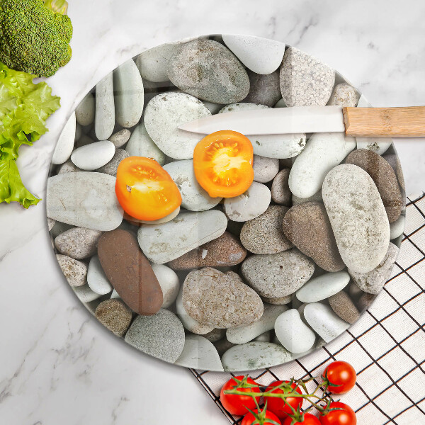 Chopping board glass Background small stones