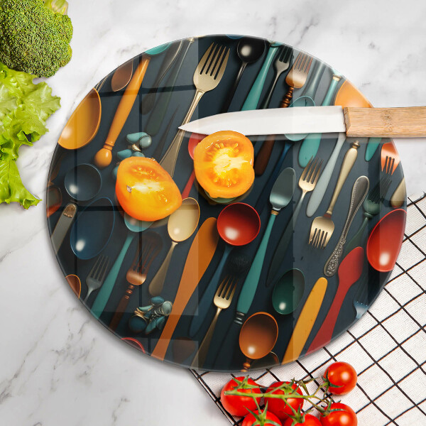 Chopping board Colorful spoons and forks
