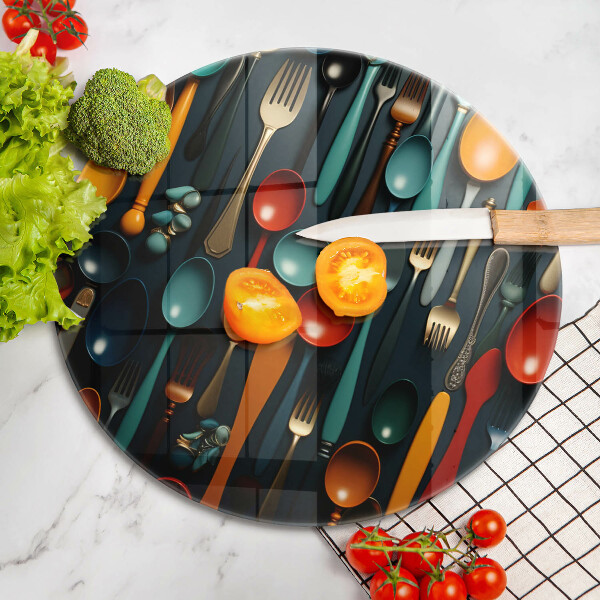 Chopping board Colorful spoons and forks