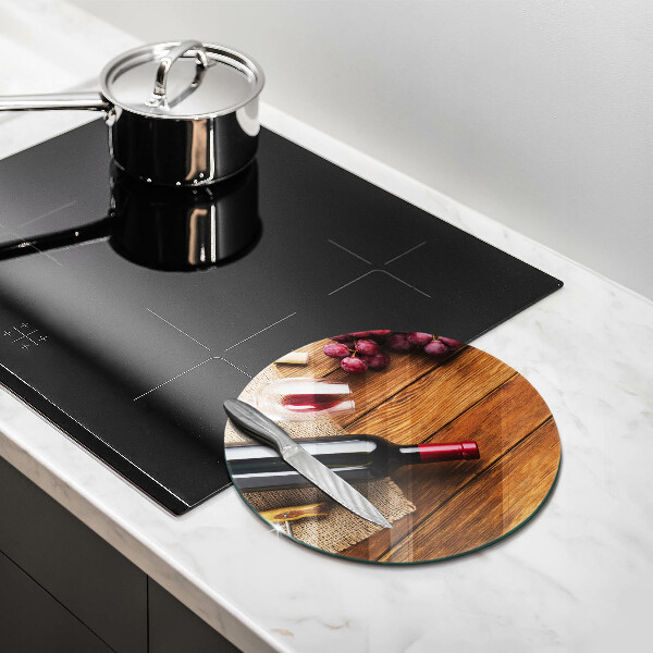 Chopping board glass A bottle of red wine