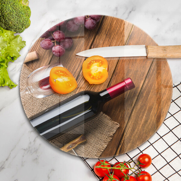 Chopping board glass A bottle of red wine