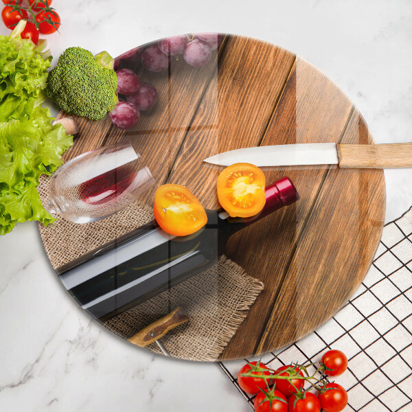 Chopping board glass A bottle of red wine