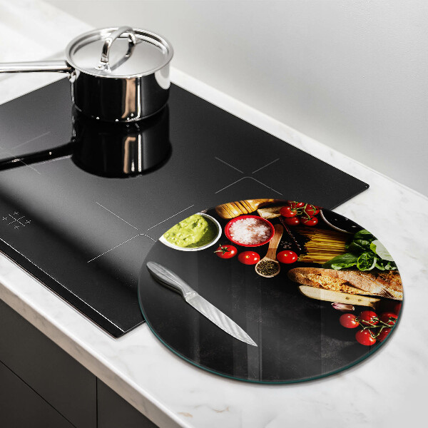 Chopping board glass Italian ingredients and spices