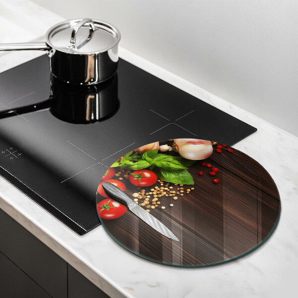 Chopping board glass Vegetables on the table