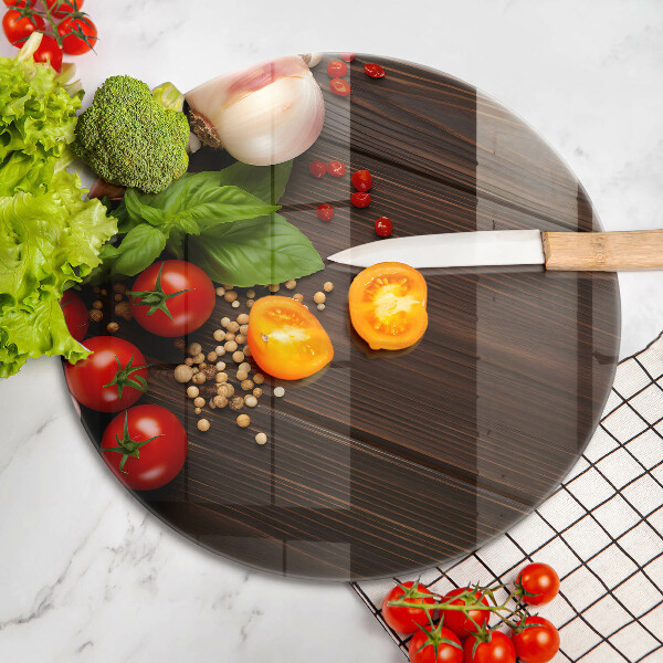 Chopping board glass Vegetables on the table