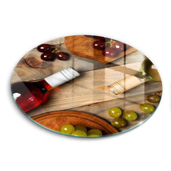 Chopping board glass Bottles of wine and grapes