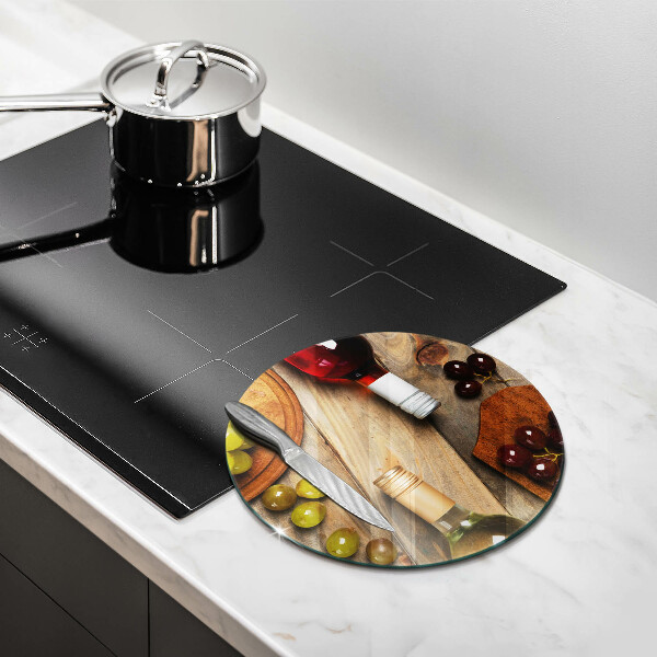 Chopping board glass Bottles of wine and grapes