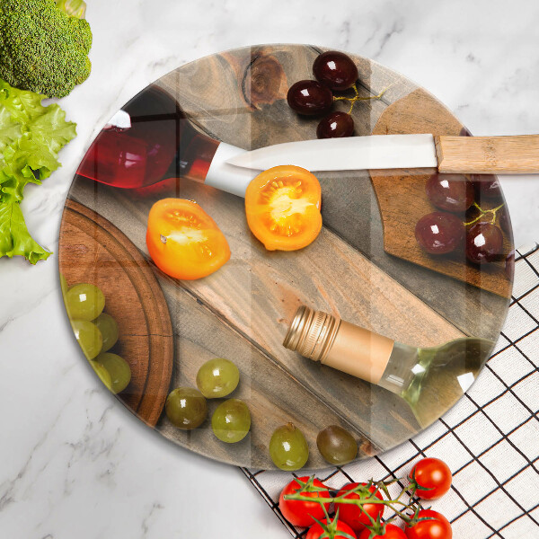 Chopping board glass Bottles of wine and grapes