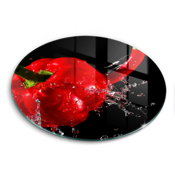 Chopping board glass Red peppers in water