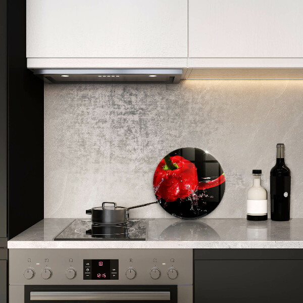 Chopping board glass Red peppers in water