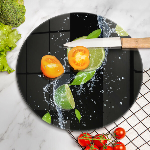 Chopping board glass Juicy lime in water