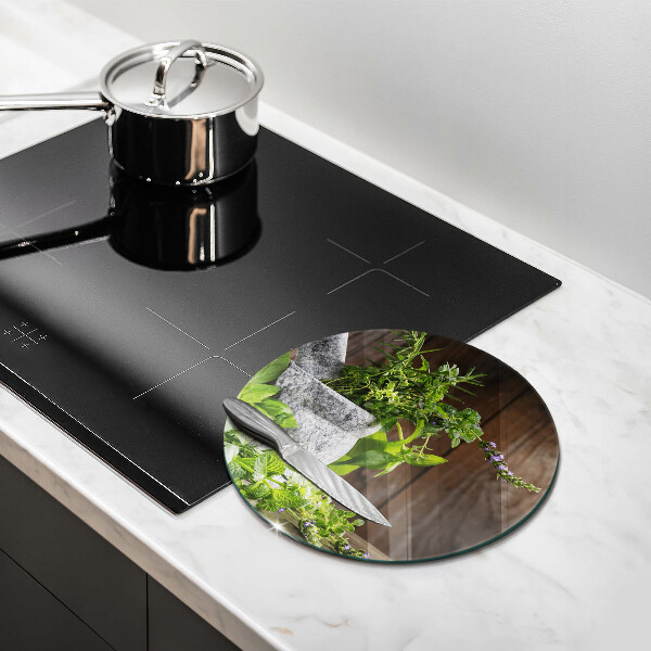 Chopping board glass Herbs plants and wood