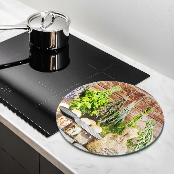 Chopping board glass Herbs spices and wood