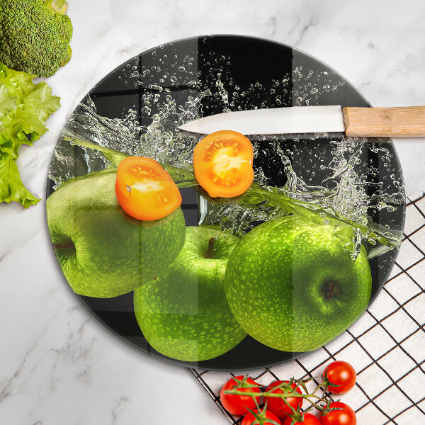 Chopping board glass Green apples and water
