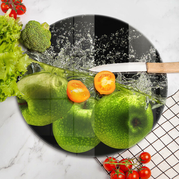Chopping board glass Green apples and water