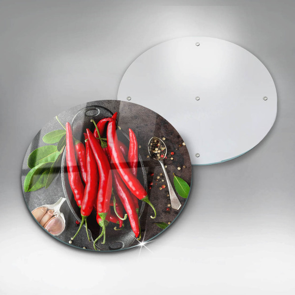 Chopping board glass Red chili peppers