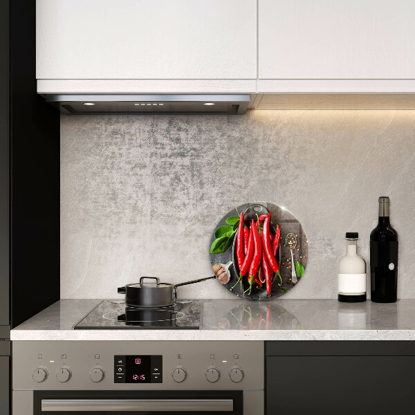 Chopping board glass Red chili peppers