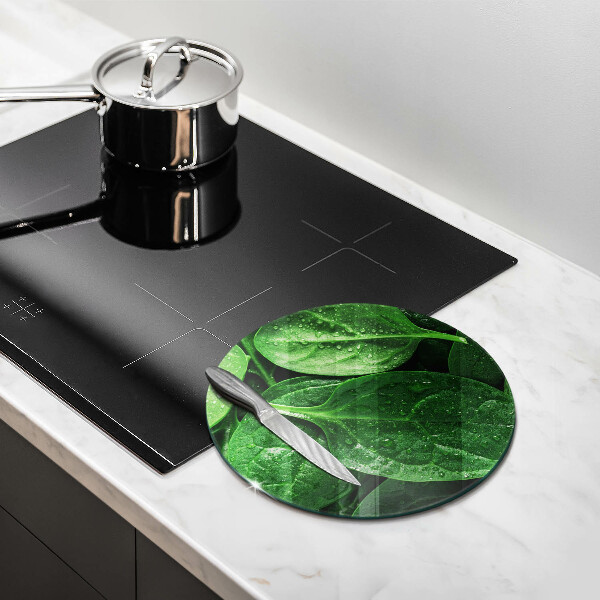 Chopping board glass Basil leaves
