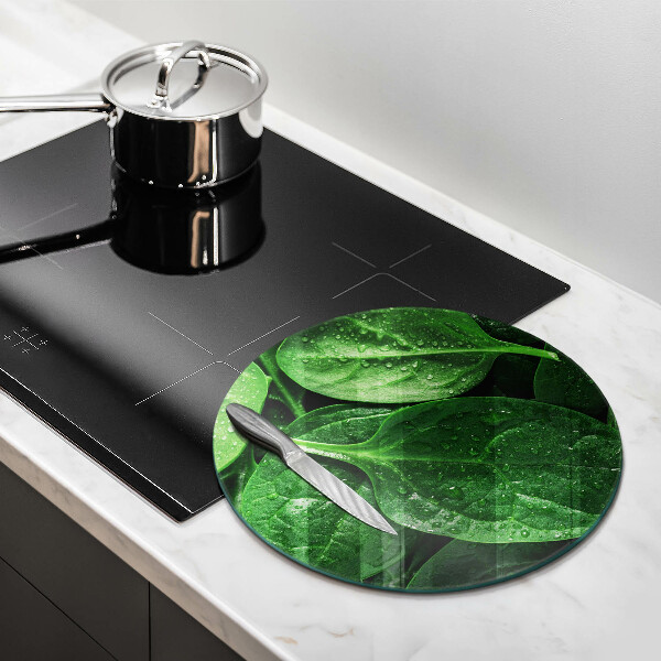 Chopping board glass Basil leaves