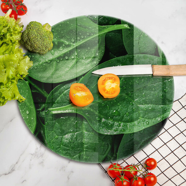 Chopping board glass Basil leaves