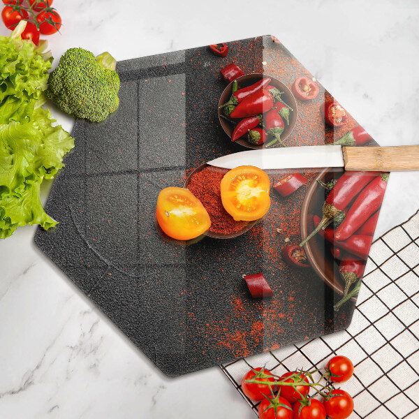 Glass chopping board Red chili peppers