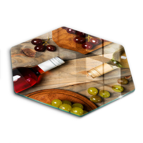 Chopping board Bottles of wine and grapes