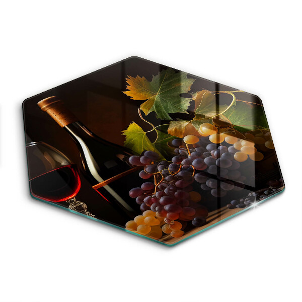 Chopping board A glass of wine and grapes