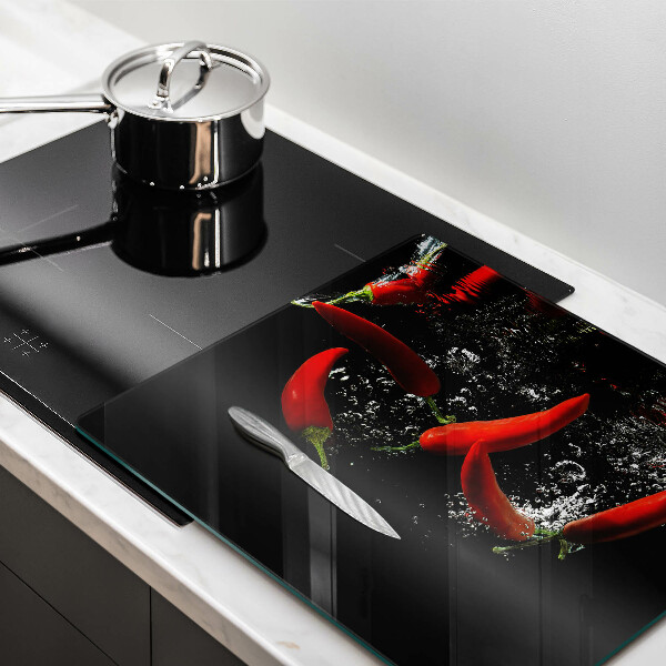 Kitchen worktop saver Chili peppers in water