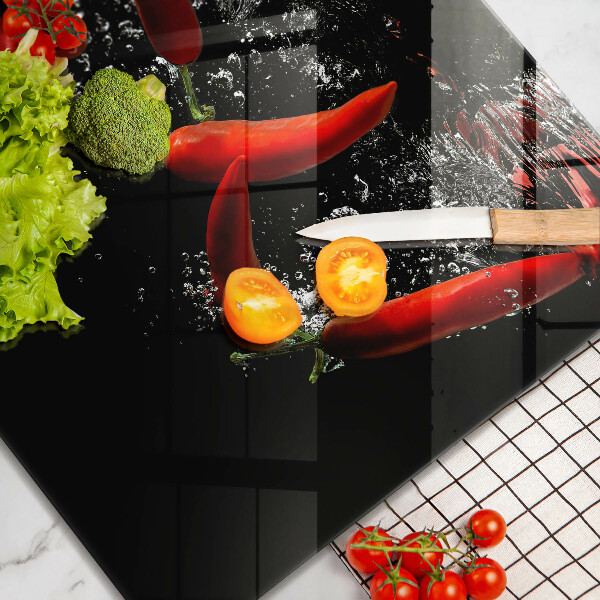 Kitchen worktop saver Chili peppers in water