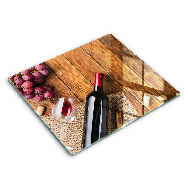 Glass kitchen board A bottle of red wine