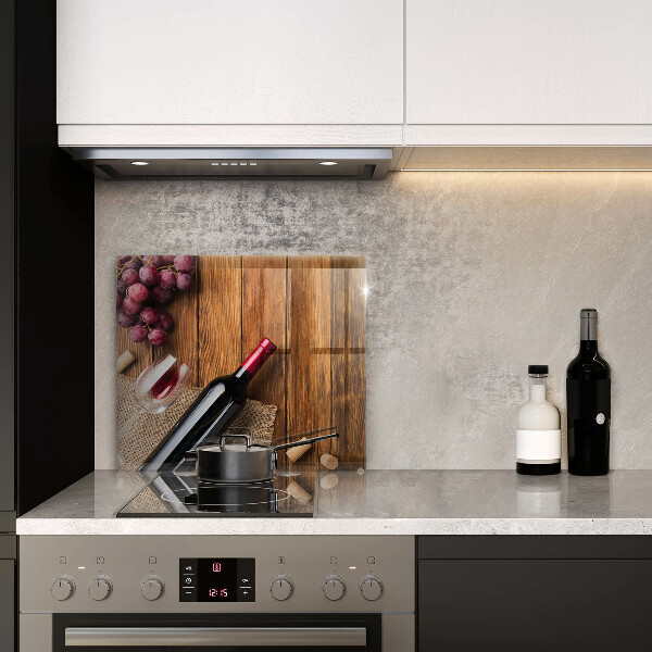 Glass kitchen board A bottle of red wine