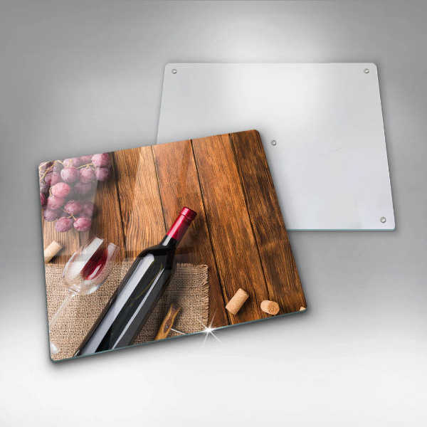 Glass kitchen board A bottle of red wine