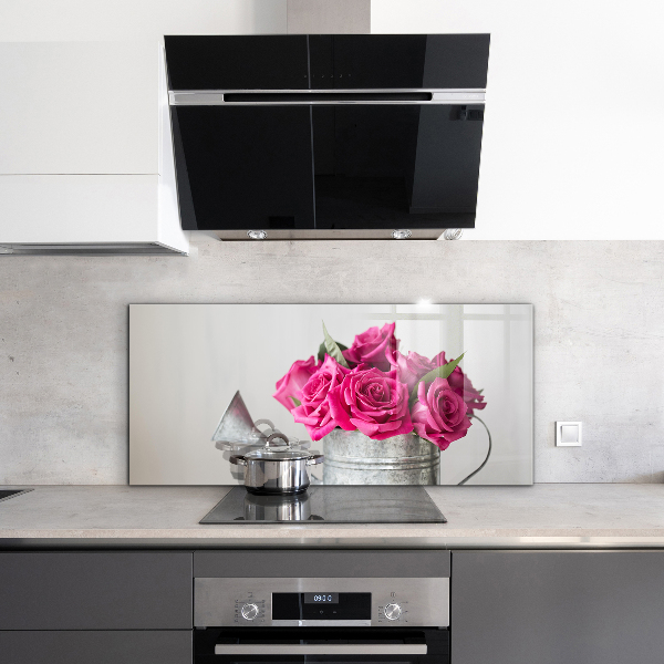 Kitchen splashback Watering can with a bouquet of roses