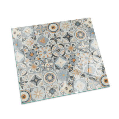 Square glass hearth for log burner Mosaic patterns in tiles