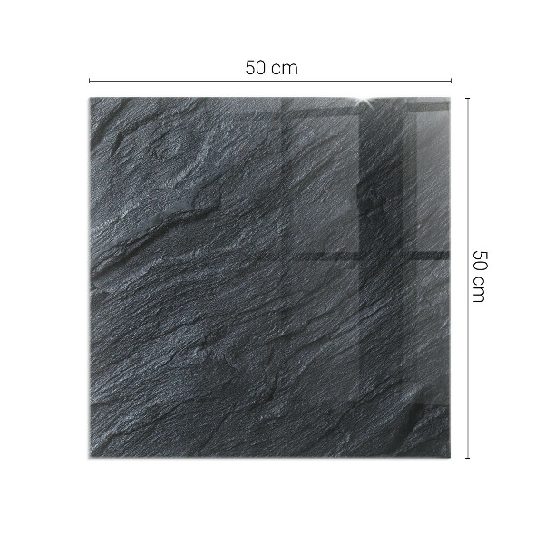 Square glass hearth for log burner Stone surface texture