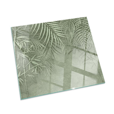Square glass hearth Tropical leaves in the background