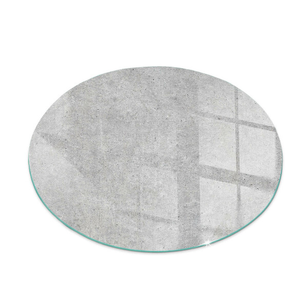 Round glass hearths for wood burners Raw concrete texture
