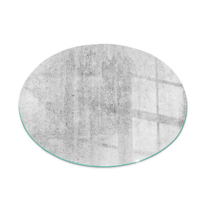 Round glass fire hearth Raw concrete texture