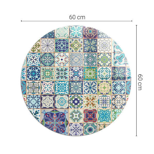 Round glass fire hearth Mosaic patterns on tiles