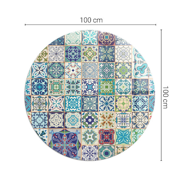 Round glass fire hearth Mosaic patterns on tiles