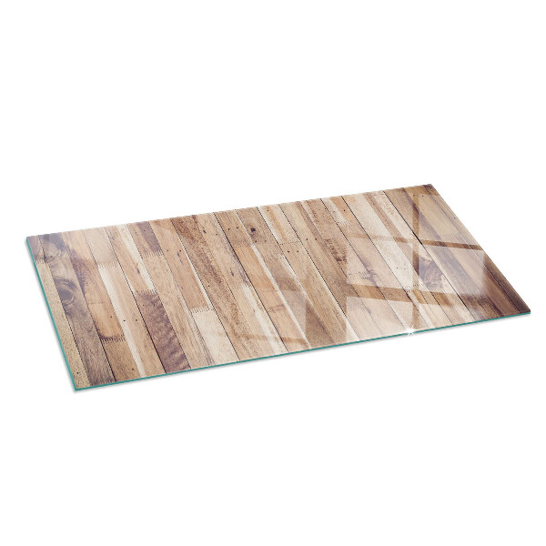 Rectangular glass hearth for wood stove Wooden board in the layout