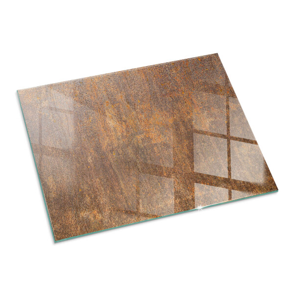 Rectangular glass hearth for log burner Rust texture on metal