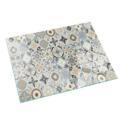 Rectangular glass hearth for log burner Mosaic patterns in tiles