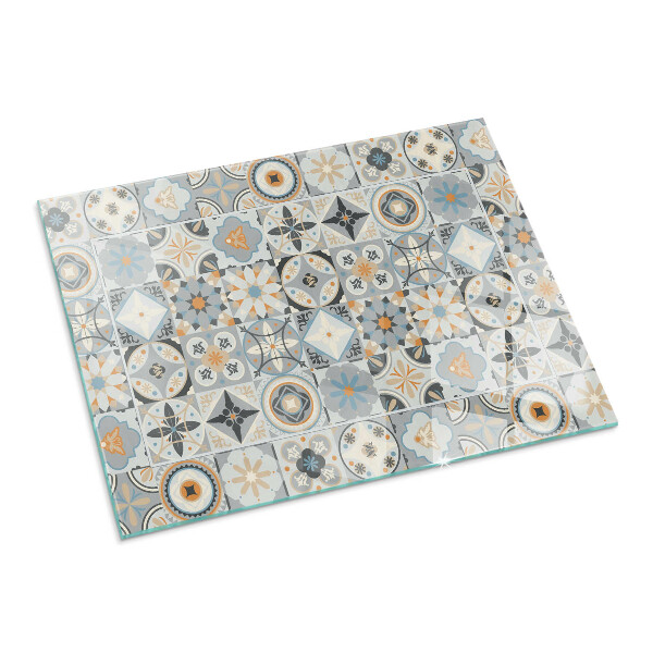 Rectangular glass hearth for log burner Mosaic patterns in tiles
