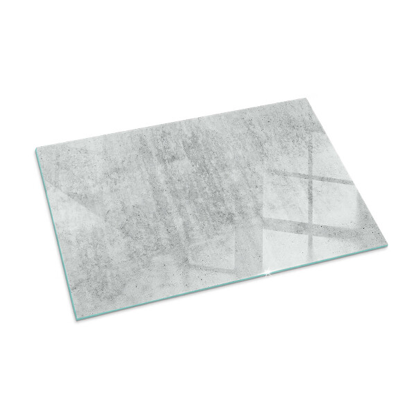 Rectangular glass hearth for log burner Raw concrete texture