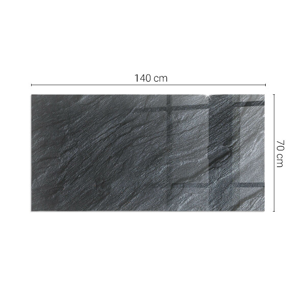 Rectangular glass hearth for log burner Stone surface texture