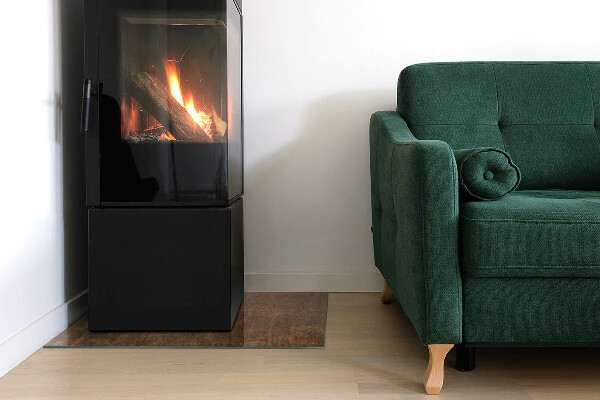 Rectangular glass hearth for log burner Rust texture on the background